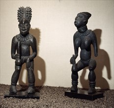 Two of the best known African sculptures, these figures appear to be by the same hand