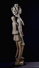 A maternity figure in the Sakalava style possibly a house post