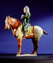 Tomb figure in the form of a musician (drummer) mounted on a horse