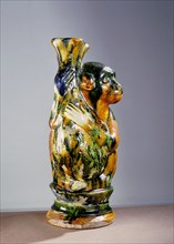 Wine ewer in the form of monkey holding a wineskin