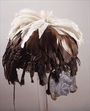 Fez style hat with feather plumes