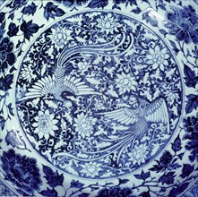 Detail of a blue and white plate with representations of the male and female phoenix