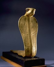 Gold statue of Netjer Ankh (living god) made of guilded wood found in one of the black shrines of the Tutankhamun burial