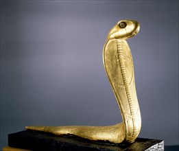 Gold statue of Netjer Ankh (living god) made of guilded wood found in one of the black shrines of the Tutankhamun burial