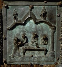 Detail of the bronze door of the Basilica of San Zeno which is decorated with 48 panels illustrating biblical stories and the lives of St Peter, St Paul, St Zeno, St Helena among others, and items con...