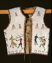 Beadwork decoration on a sleeveless jacket showing fighting between Indians and white men