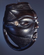 Cup carved in the shape of a head, used by chiefs in the ceremonial drinking of palm wine