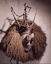 Masks known as Mbala are danced during ceremonies following the initiation of boys marking their circumcision and transition to adult status