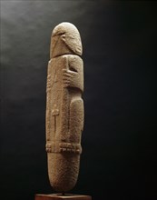 Phalliform stone figure of a deity, possibly Guetar