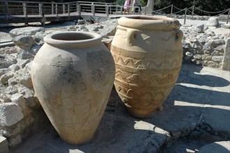 Large vessels or pithoi used for storing oil, grain and fish