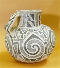 Chacomy white ware pitcher decorated with a spiral design