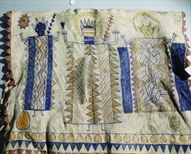 Warriors cloak painted with representations of a god and spirits