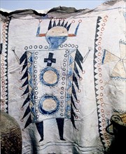 Detail of a warriors cloak painted with a figure of an Apache Kan (god)