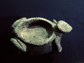 Pigment mortar in the form of a horned toad