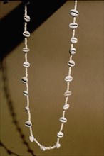 Long necklace made from shell and stone beads
