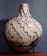 Pottery vase with black on white geometric design