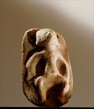 Stone figure, possibly a fertility goddess