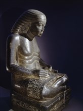 Statue of the influential minister of Amenhotep III, Amenhotep son of Hapu, as a scribe