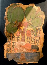 The tomb owner, Iry Nufer kneels beneath a date palm to drink from a pool