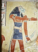 A detail of a wall painting in the tomb of Khaemwaset, a son of Ramses II depicting a lion headed spirit or divine being