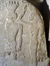 A relief from the tomb of Nefermaat at Maidum showing offering bearers with fish