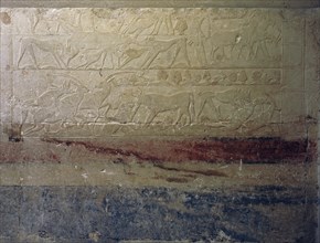 A scene in relief in the tomb of the vizier Mereruka showing wild dogs attacking antelope