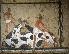 A painting from the tomb of Ity depicting the slaughtering of an ox