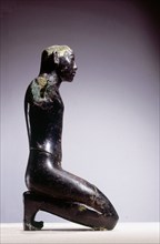 Statue of King Amenemhat III in kneeling posture