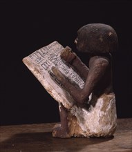 Wooden model of a scribe