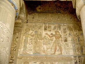 The pharaoh Ramesses III offering to the god Osiris