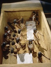 Wooden model depicting a weavers workshop