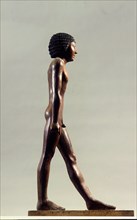 A statue of Meryre haishtef which has been carved from a single piece of ebony