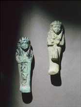 Faience overseer shabti and shabti from the burial of King Amenemope at Tanis