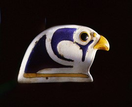 Glass falcon head, the terminal from a collar