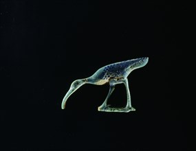 Blue glass furniture inlay in the form of a wading bird hieroglyphic sign