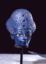 Miniature blue glass paste head of the pharaoh Amenophis III, wearing the blue war crown