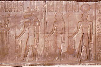 Relief with the gods Horus, Hathor and Khnum