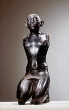 Statue of King Amenemhat III in kneeling posture