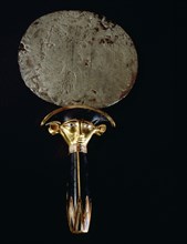 Silver mirror of princess Sathathoryunet, with handle in the form of a papyrus stem and the double sided face of the cow   goddess Hathor