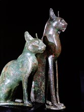 Two bronze figures of cats