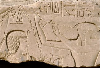 Amarna style reliefs from the time of Amenhotep IV (better known as Akhenaten) depicting the god Horus performing a purification