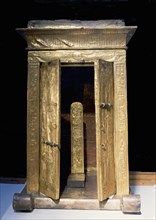 The little golden shrine of Tutankhamun containing the pedestal with the kings nomen and prenomen