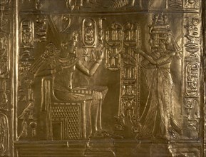 A detail of the gilt shrine of Tutankhamun which originally contained statuettes of the royal couple