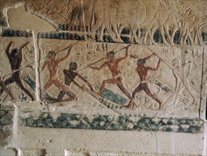 A relief in the tomb of Kagemni men in reed boats engaged in a mock fight with punting poles