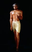 Sculpture of a male figure, thought to be from the funerary temple of Mentuhotep at Deir el Bahari