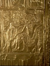 A detail of the gilt shrine of Tutankhamun which originally contained statuettes of the royal couple