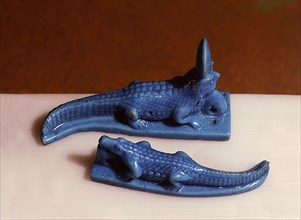 Two amulets, one in the form of a falcon   headed crocodile representing Sobk   Horus or Sobk   Re (4