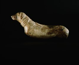Carving of a dog