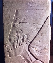A detail of a relief showing Nefertiti wearing the crown with the ureaus