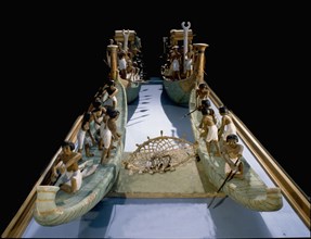 Wooden model depicting fishing boats from the tomb of Meketre